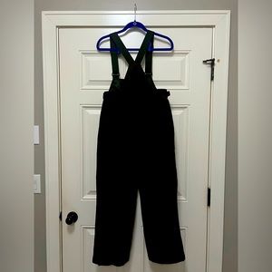 Girls XL snow bibs by Boulder Wear.